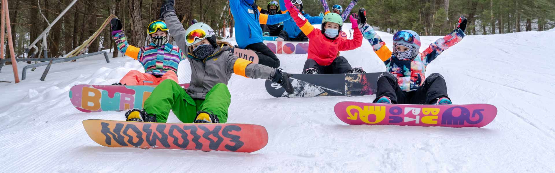 Female snowboarders in Girls Rock the Park program