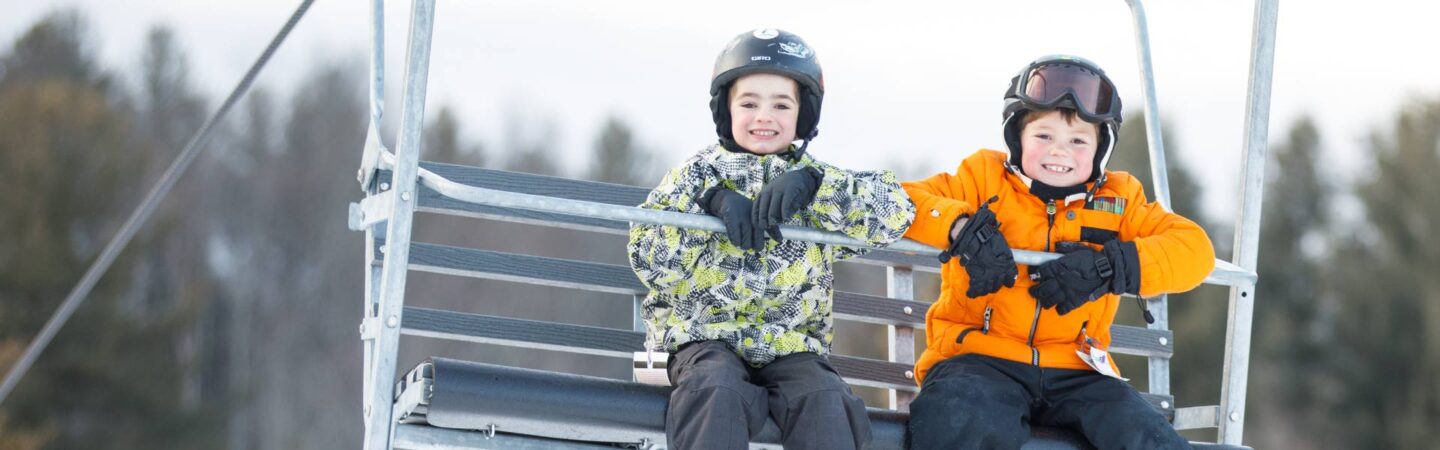 Two boys on chairlift