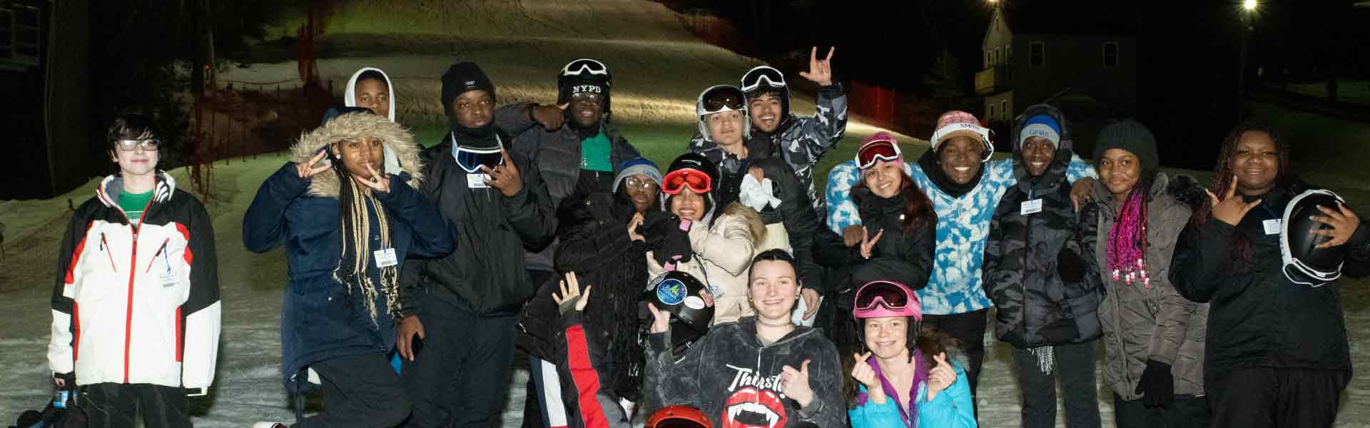 Group of skiers and snowboarders visiting the mountain as a single visit group.