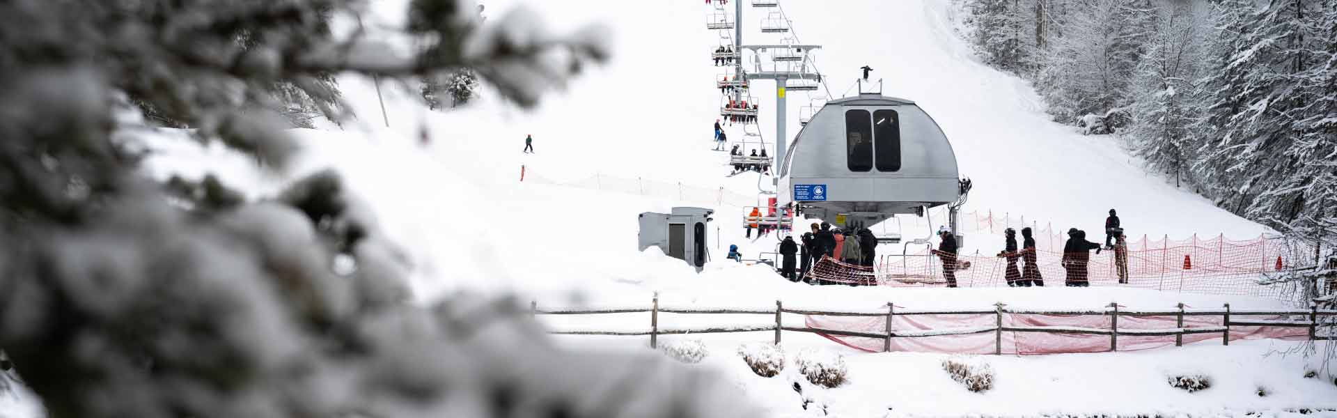 View of fisrt Quad lift with conveyor in CT at Ski Sundown.